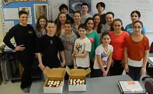  Jessa Sahakian of Yum Bunnies (left) accepts congratulations from the Watertown Splash staff after winning the third annual Splash of Flavor competition.