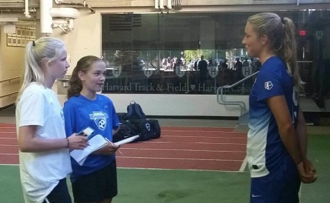 Kristie Mewis of the Boston Breakers (right) talks with reporters following the Breakers' 3-2 loss to the Seattle Reign on June 21, 2015.