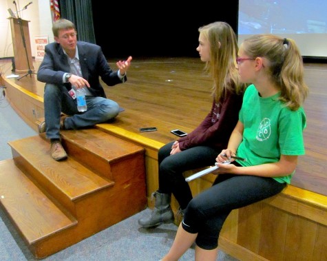 Carl Dietrich of Terrafugia talks flying cars with Watertown Splash reporters before his presentation at Watertown Middle School on Oct. 7, 2015.