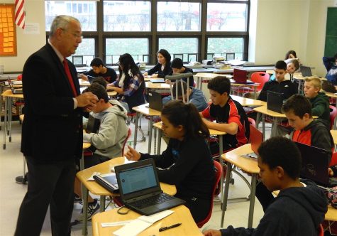 Dr. John Brackett (left), the Watertown Public Schools interim superintendent, speaks with Watertown Splash reporters in the newsroom at Watertown Middle School on Nov. 16, 2016. 