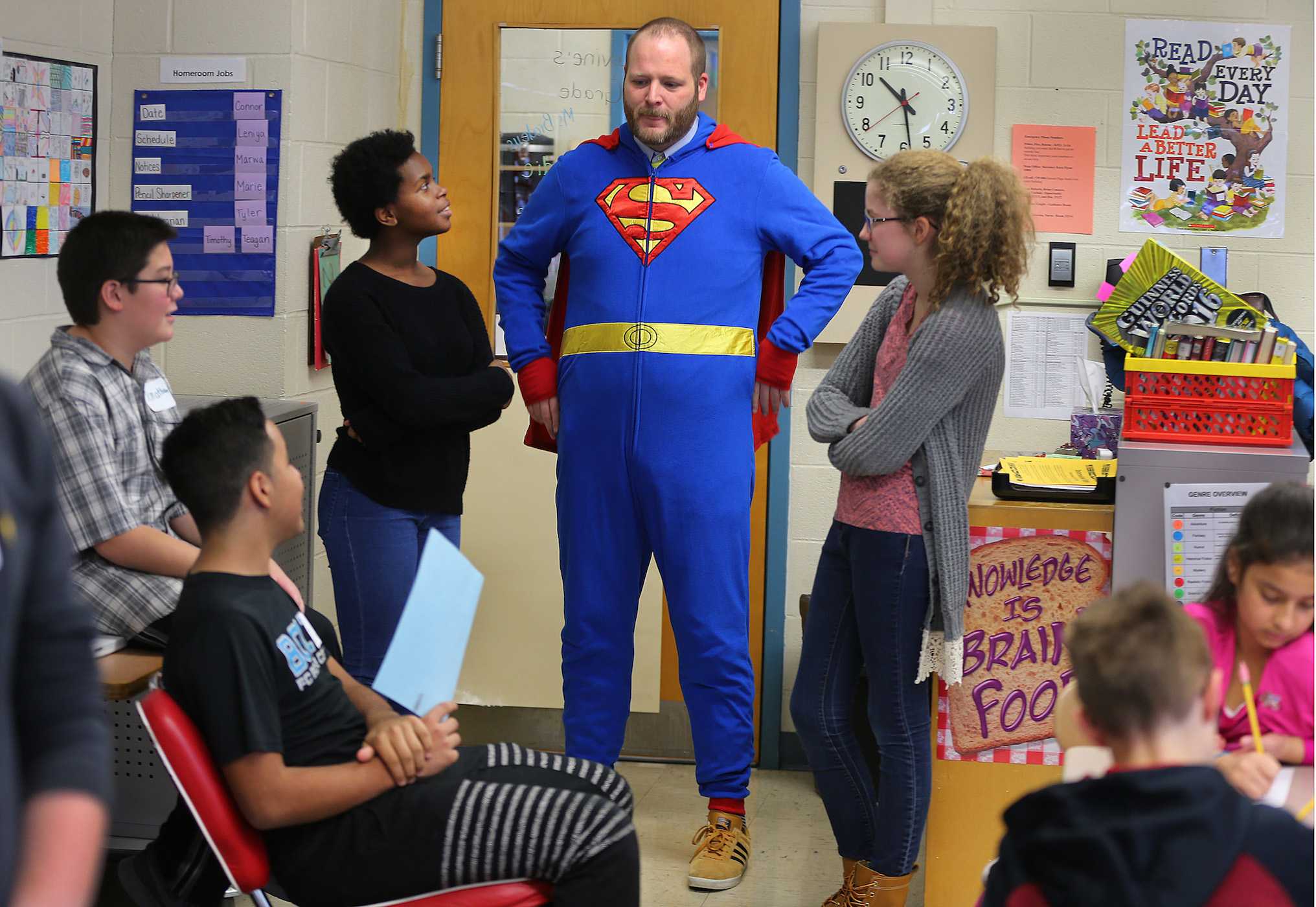 Phil Oates (center) has taken on a new role in Watertown: interim principal at Lowell Elementary School.