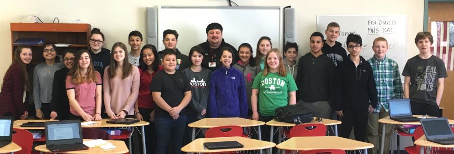 Watertown chef Mike Fucci (center, with hat) poses with reporters from the Watertown Splash during his visit to Watertown Middle School on March 17, 2017. The author and owner of Chef Mikes Catering was interviewed in the Watertown Splash newsroom about his victorious appearance on Food Networks Cutthroat Kitchen.