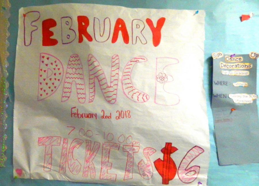 Sign advertising the upcoming Valentines dance at Watertown Middle School.