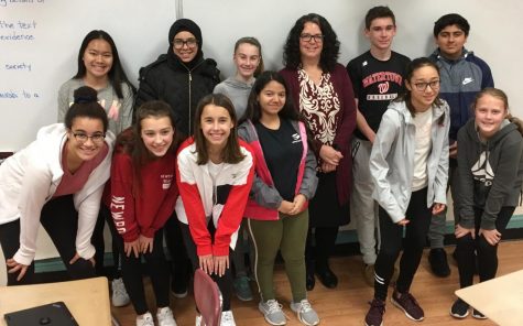 New Watertown Middle School principal Donna Martin (back row, third from right), poses with student reporters after a recent interview in the Watertown Splash newsroom.